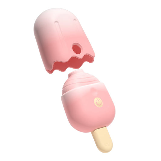 A product graphic showing the pastel pink popsicle toy splitting open to reveal its hidden internal suction nozzle and core under a removable protective cap.