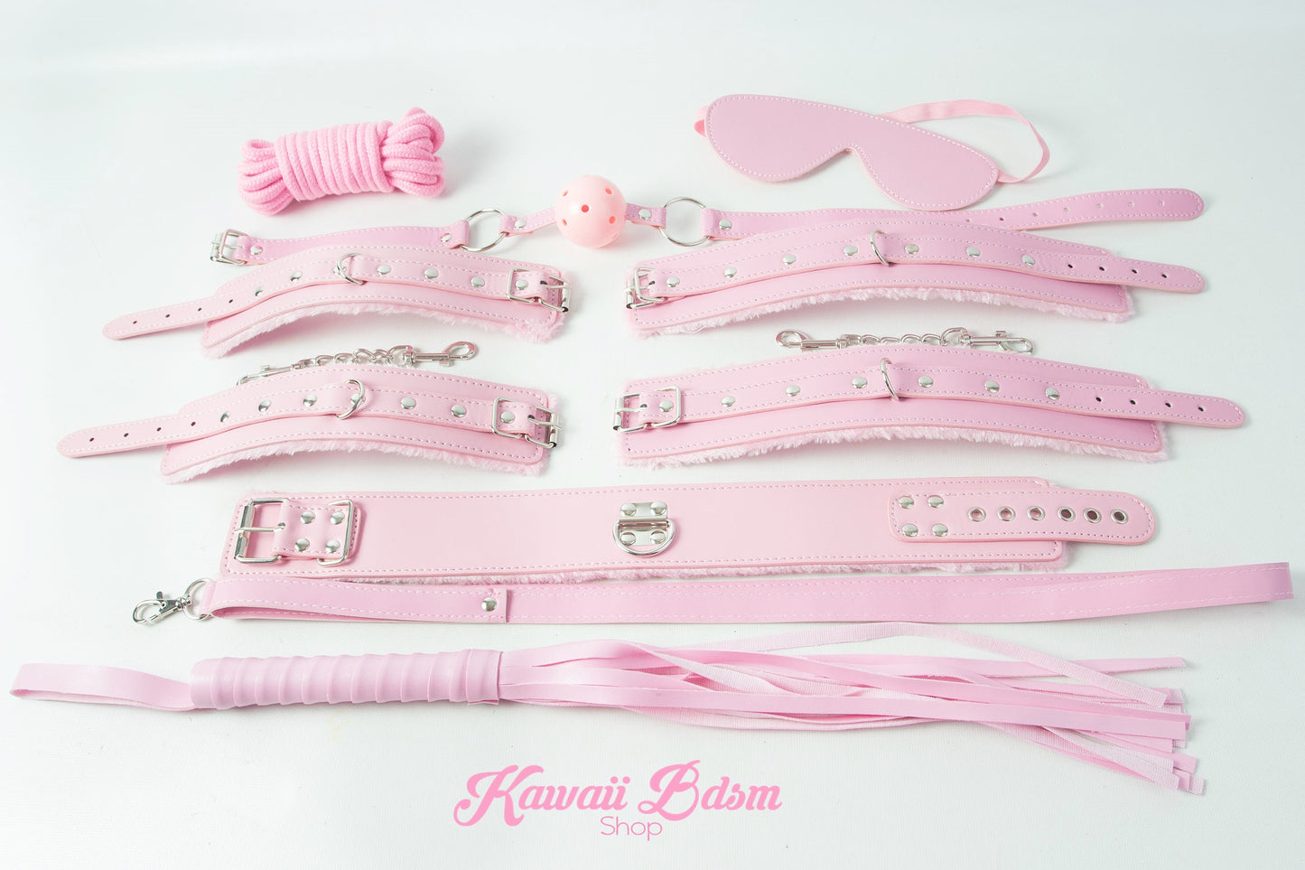 Comprehensive overview of the 7-piece pink kinky set, from the bondage rope to the eye mask.