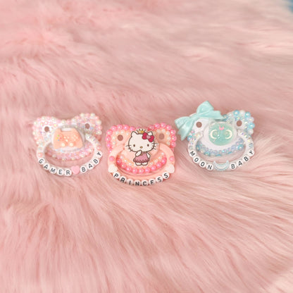fully handmade adult pacifiers paw hello kitty tototro bow crystal encrusted  ddlg mdlg babygirl geplay petplay kitten cute pink pastel  little one daddy kawaii bdsm shop
