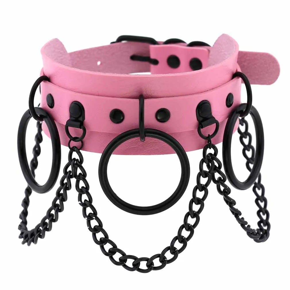 Pink vegan leather Brat collar with high-contrast black metal chains for an edgy egirl style.