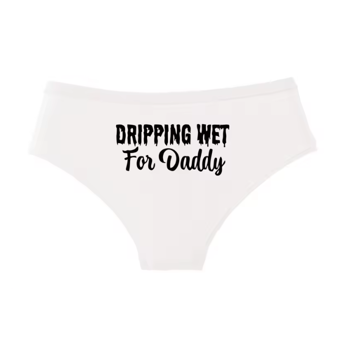 White panties with dripping font text 'DRIPPING WET For Daddy'. Naughty DDLG and submissive lingerie