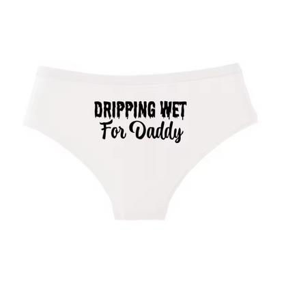 White panties with dripping font text 'DRIPPING WET For Daddy'. Naughty DDLG and submissive lingerie