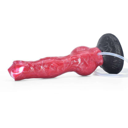 Dark cherry red marbled fantasy toy with a black suction cup base lying down, showing its textured shaft.
