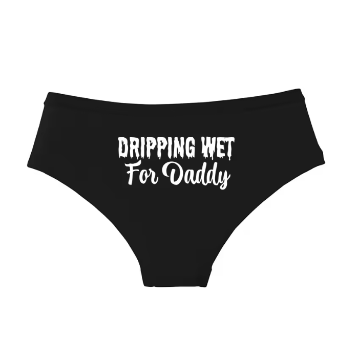 Cute black undies featuring a dripping text design. Kawaii BDSM playwear and ageplay aesthetic.
