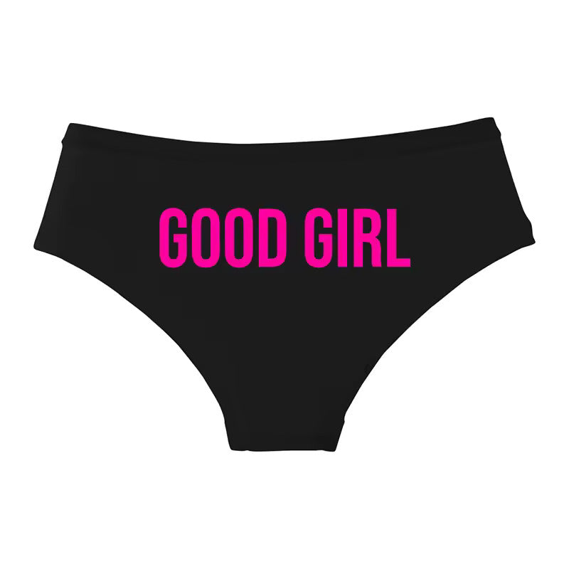 Stretchy black undies with 'Good Girl' slogan. DDLG lifestyle apparel and submissive branding gear.