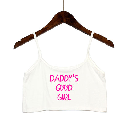 White spaghetti strap top with 'Daddy's Good Girl' pink text. Sweet and kinky alternative crop top