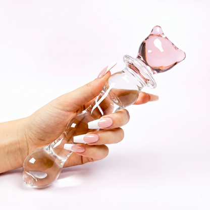 Hand gently gripping the kawaii pink kitty glass wand, showcasing its perfect size and shape for temperature play.