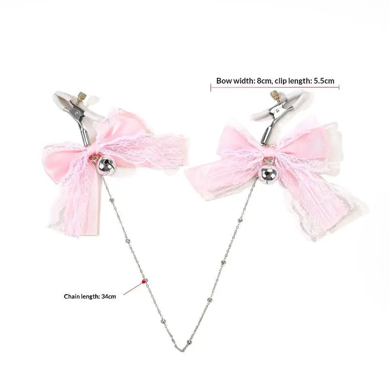 Dimensions of the kawaii pink ribbon nipple clamps showing the width of the bows, clip size, and total chain length.