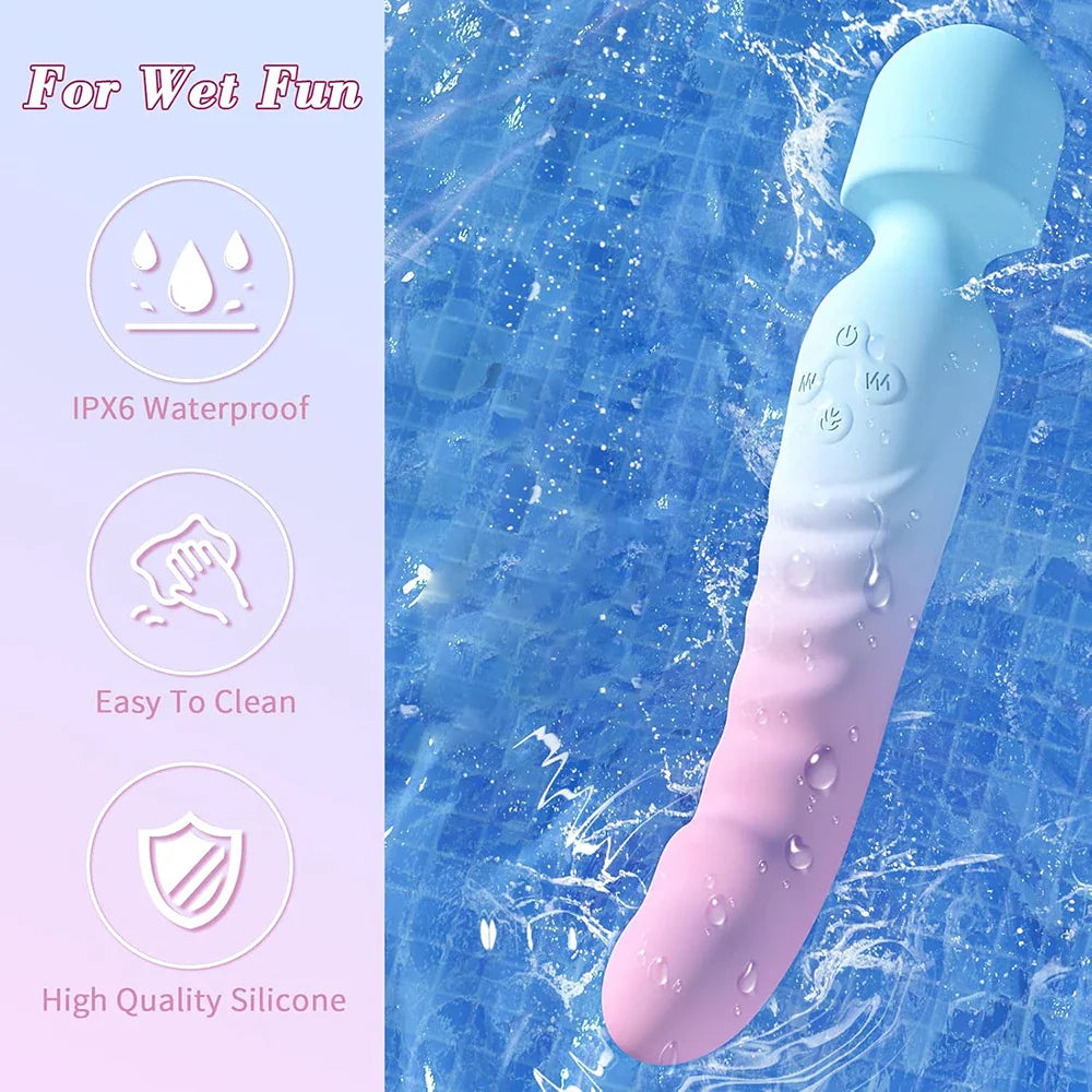 The blue and pink Sweet Surrender dual wand submerged in clear splashing water against a blue tiled background, highlighting its IPX7 waterproof and easy-to-clean features