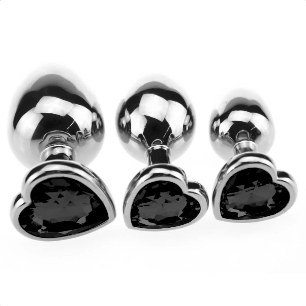 3-piece stainless steel training set featuring elegant midnight black crystal heart bases in small, medium, and large.