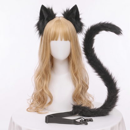 A black posable faux fur animal tail and matching ears set displayed on a mannequin head with a blonde wig. The long tail is curled into an S-shape and clearly features a black adjustable waist strap for SFW cosplay.