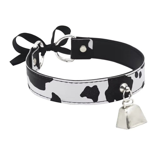 Kawaii-style black and white cow patterned leather collar for pet play.