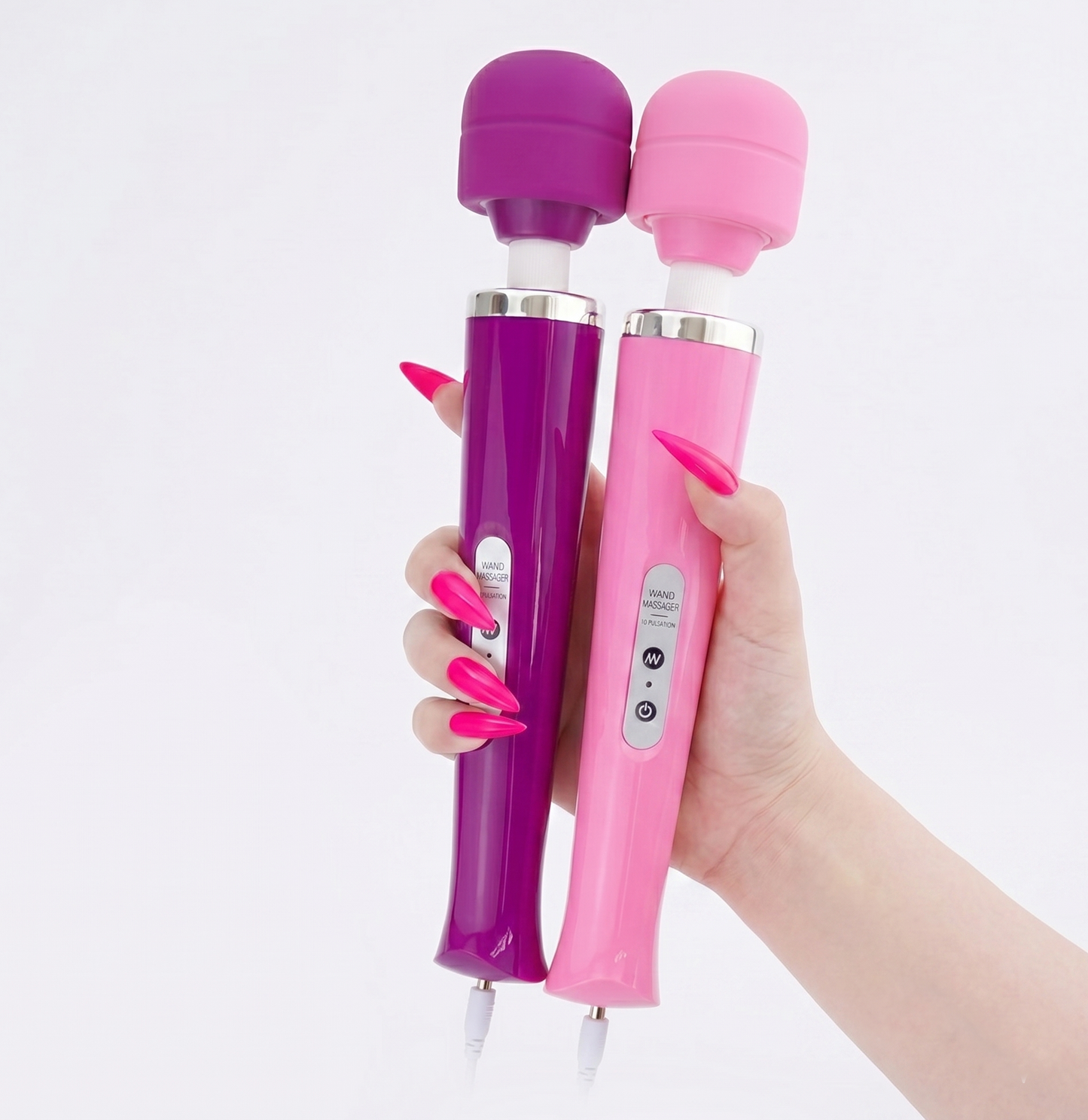 A hand holding both the deep purple and bright pink magic wand vibrators together, showcasing the aesthetic vibrant colors and premium silicone finish.