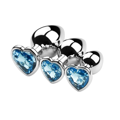 Three-piece stainless steel plug set showcasing cute light blue crystal heart bases, perfect for temperature play.