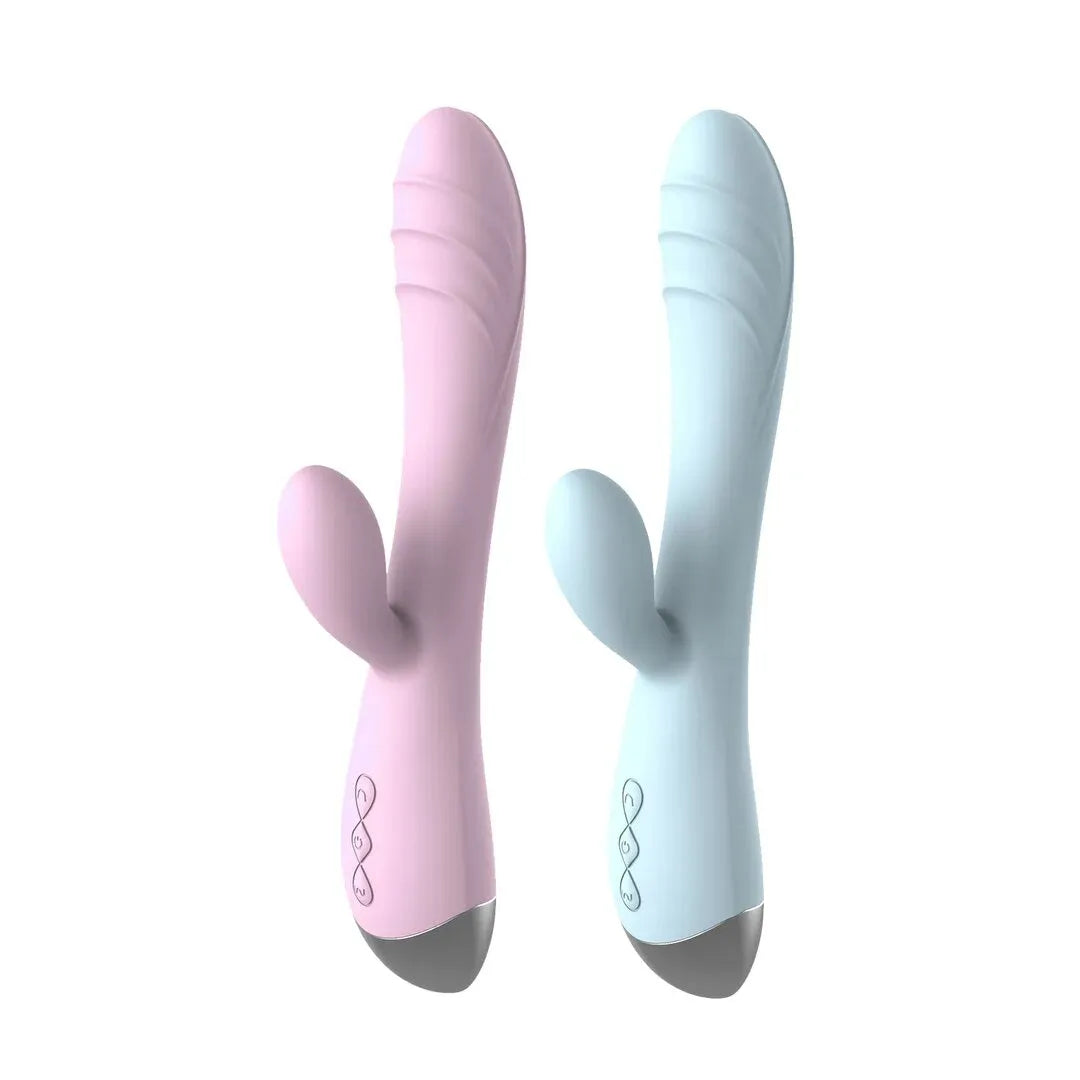 The Pastel Dream Rabbit Vibrator in baby pink and ice blue, standing side by side against a clean white background.