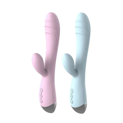 The Pastel Dream Rabbit Vibrator in baby pink and ice blue, standing side by side against a clean white background.