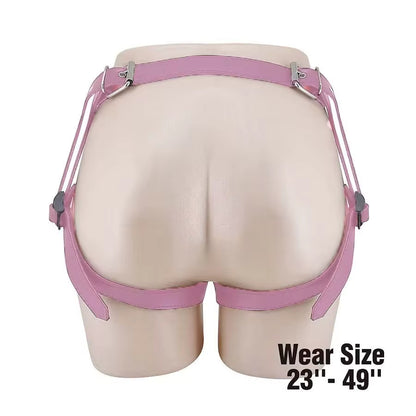 The back view of a pastel pink vegan leather butterfly harness on a mannequin, highlighting the adjustable thigh and waist straps that accommodate wear sizes from 23 inches to 49 inches.