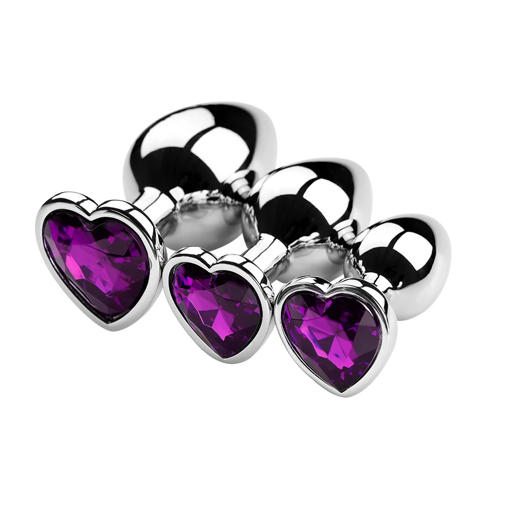 Three-piece aesthetic metal plug set featuring stunning deep purple crystal heart bases.