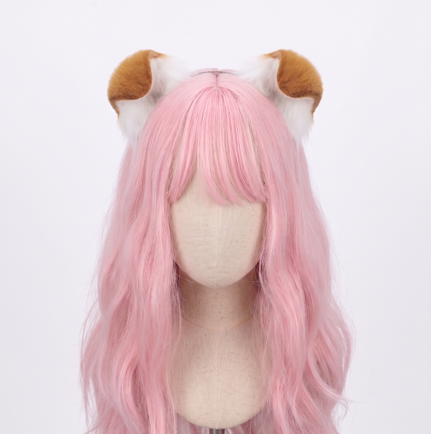 Front-facing view of a mannequin with a pastel pink wig wearing ultra-soft white faux fur puppy ears with floppy light brown tips, adding an innocent and submissive touch to any kawaii BDSM look.