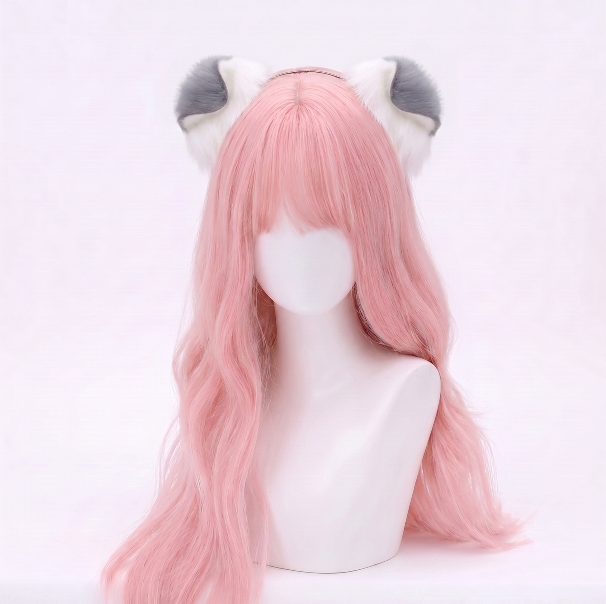Mannequin styled with a pink wig wearing a pair of voluminous white faux fur puppy ears with dark grey tips, perfect for stepping comfortably into a playful puppy headspace.