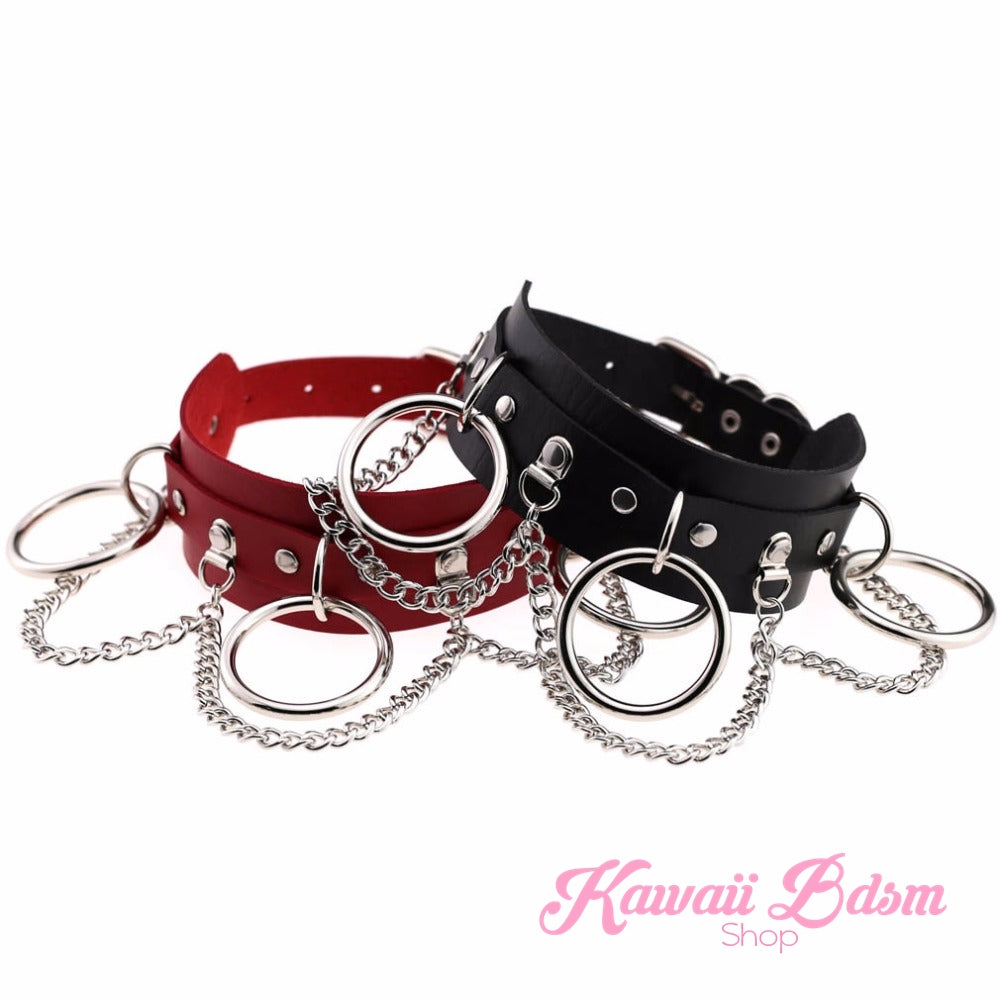 Brat collar combining red and black vegan leather with silver chains, bold and naughty design.
