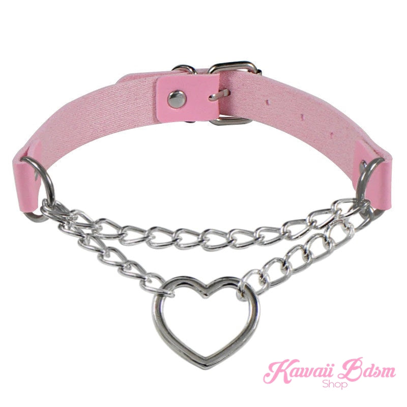 The standalone pastel pink leather Chain Heart Choker variation beautifully accented with shiny silver-toned chains and a central heart.