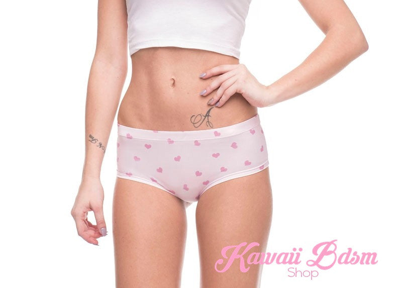 Model wearing pink heart panties shot from a side angle, showing the comfortable fit and a glimpse of the "Yes, Daddy?" text on the back.