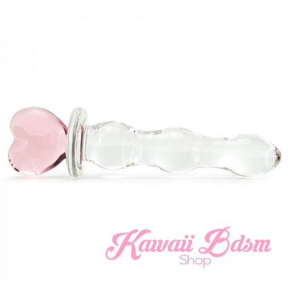 Horizontal profile view of the Heart Wand lying flat, displaying the deep ribbed texture designed for maximum stimulation.