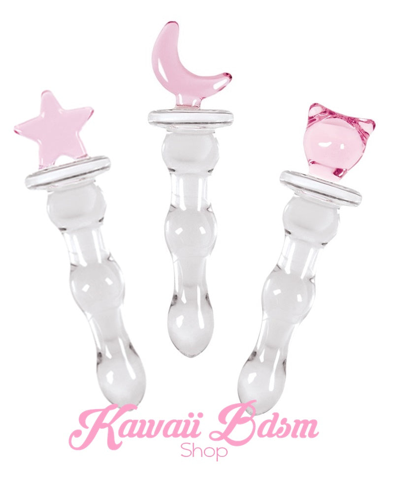 Side-by-side comparison of three kawaii clear glass pleasure wands featuring pink star, moon, and kitty handles.