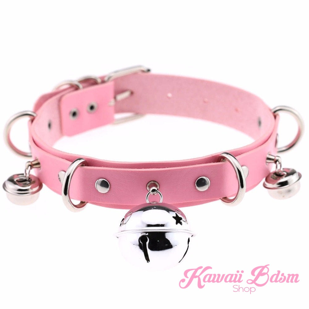Main product shot of the Kitty Cat Bell Collar in pastel pink leather with silver hardware and a large central jingle bell.