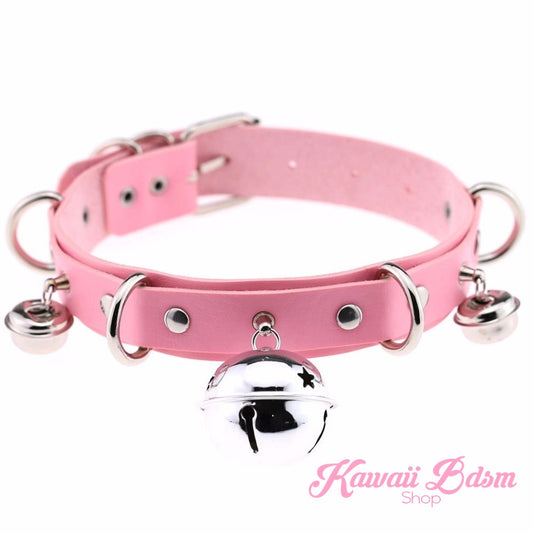 Main product shot of the Kitty Cat Bell Collar in pastel pink leather with silver hardware and a large central jingle bell.
