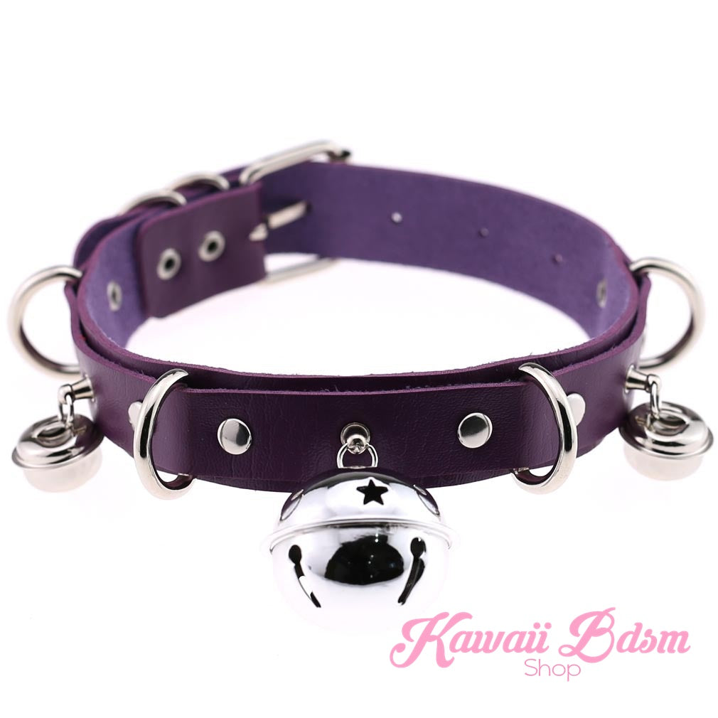 The deep purple leather cat bell collar variation featuring a polished silver buckle closure and central jingle bell.