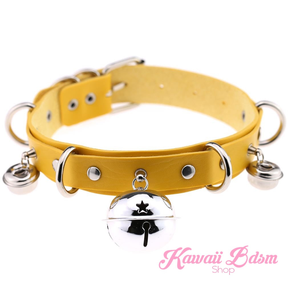 The bright yellow leather petplay choker variation featuring polished silver hardware and accent side bells.
