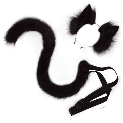 A flat lay of a black SFW posable animal tail and matching ears, clearly showing the wire-curved tail shape and the adjustable black waist strap buckle.