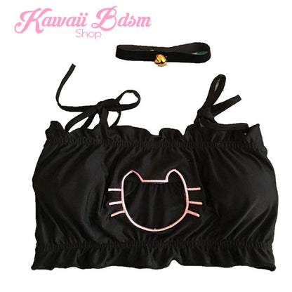 Detailed flat lay photo of the black neko lingerie top, showing the soft cotton blend material, the unique cat head shaped chest cutout, adjustable straps, and the included black velvet kitty bell collar.