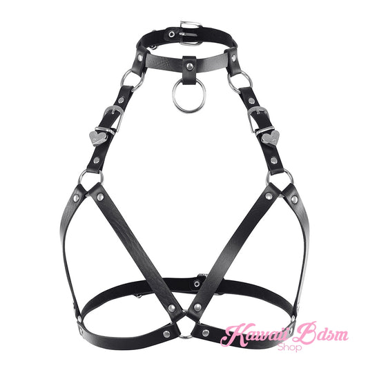 Front view of the black Baby Dom harness made of high-quality faux leather with silver O-ring and buckles.