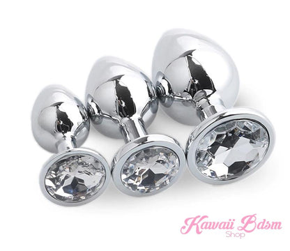 Classic jewel plug training set of three featuring elegant clear diamond-like crystal bases on a pristine white background.