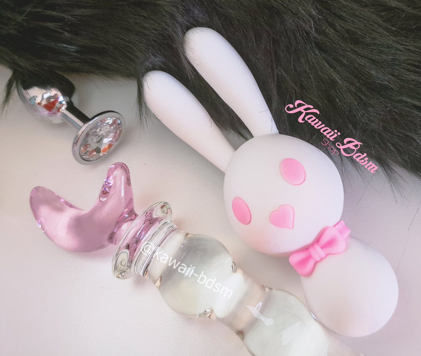 Mitzi Bunny Vibrator (A close-up lifestyle shot of the adorable white and pink Mitzi bunny vibrator highlighting its smooth silicone texture.)