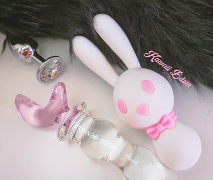 Mitzi Bunny Vibrator (A close-up lifestyle shot of the adorable white and pink Mitzi bunny vibrator highlighting its smooth silicone texture.)