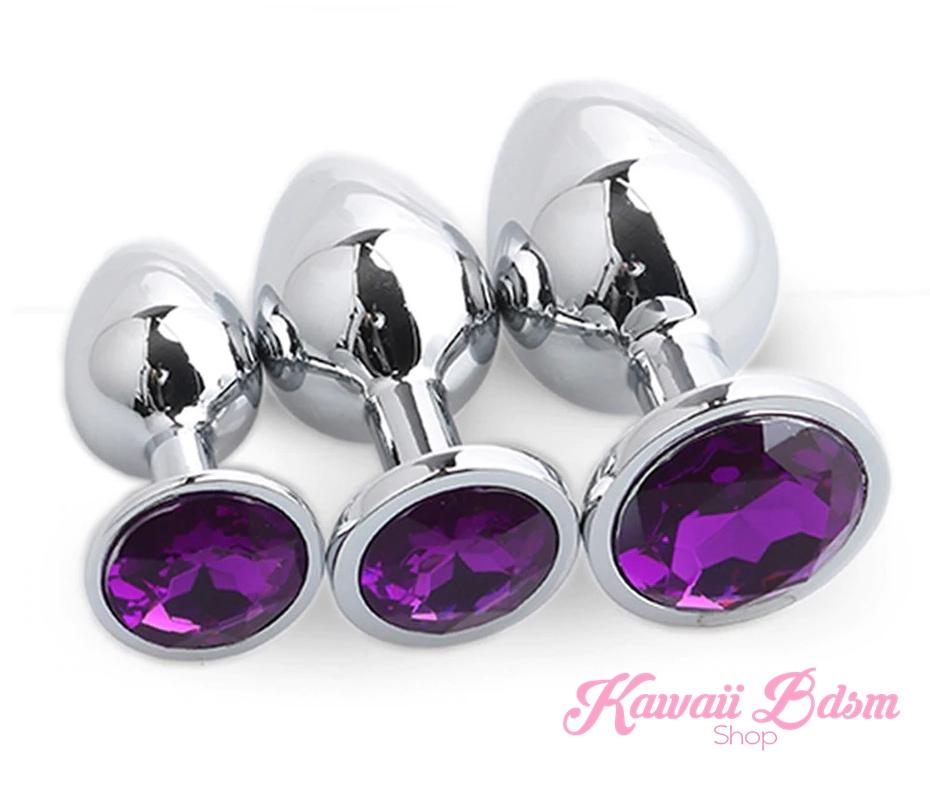 A trio of classic jewel stainless steel training plugs featuring deep purple crystal bases perfectly suited for temperature play.