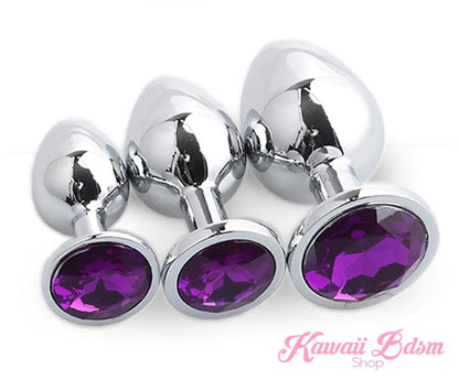 A trio of classic jewel stainless steel training plugs featuring deep purple crystal bases perfectly suited for temperature play.