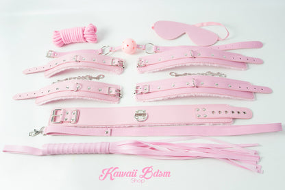 Comprehensive overview of the 7-piece pink kinky set, from the bondage rope to the eye mask.