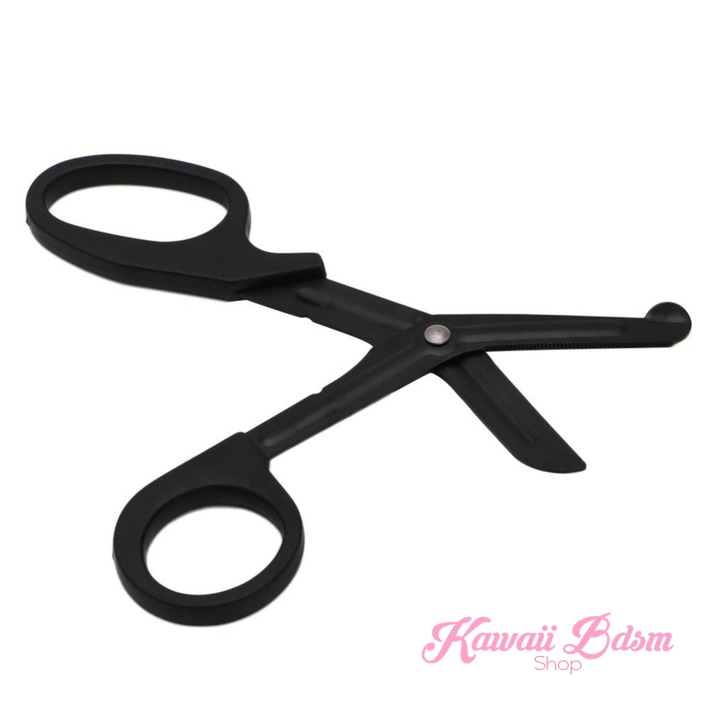 Black medical-grade safety shears slightly open, perfectly showcasing the blunt-nosed safety tip used to protect the skin during rope removal.