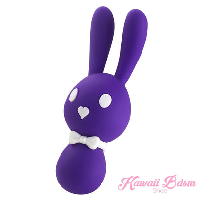 A deep purple kawaii bunny vibrator with white accents on a white background