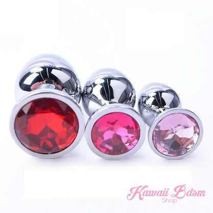 A beautifully coordinated mixed three-piece metal plug set featuring red, dark pink, and pastel pink crystal bases.