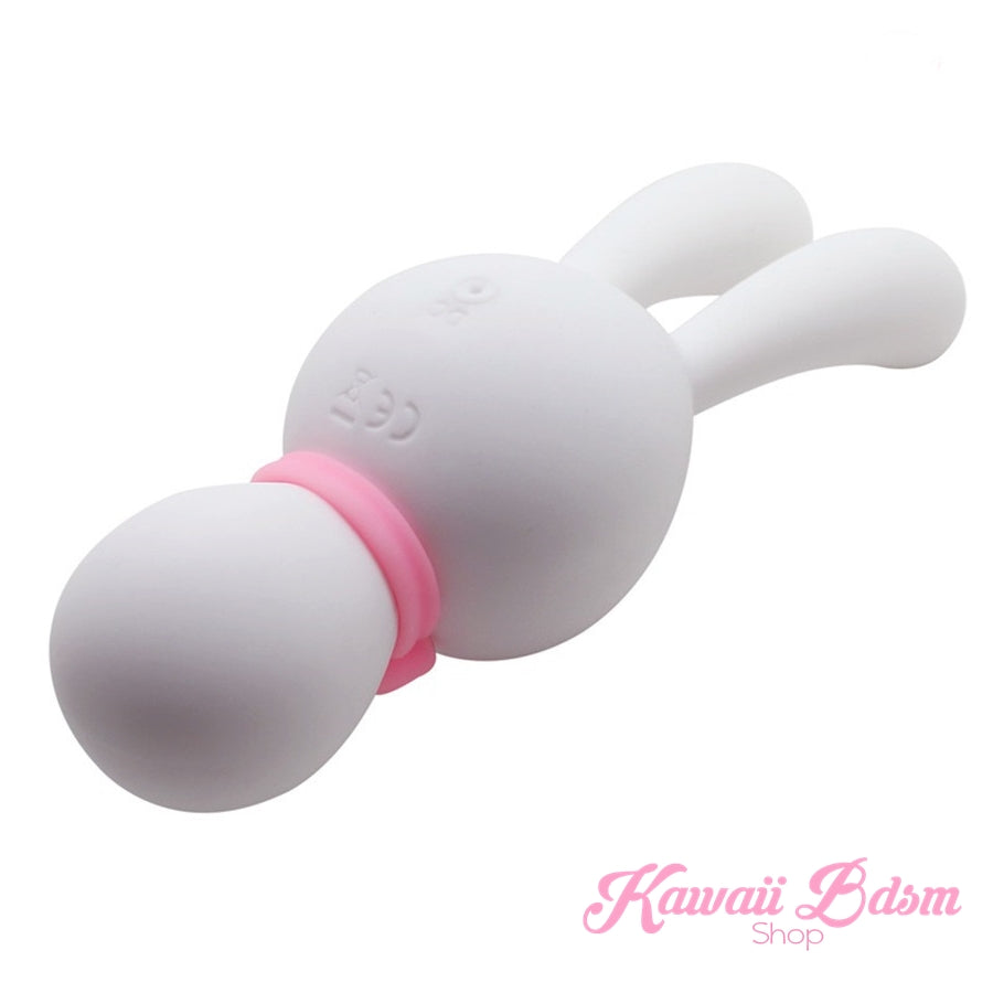 The white Mitzi kawaii bunny vibrator angled backwards, showcasing the soft, bendable silicone ears designed for targeted stimulation.