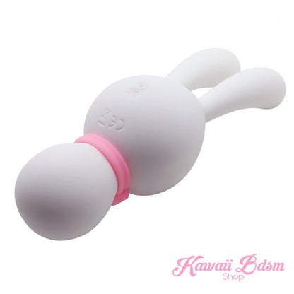 The white Mitzi kawaii bunny vibrator angled backwards, showcasing the soft, bendable silicone ears designed for targeted stimulation.